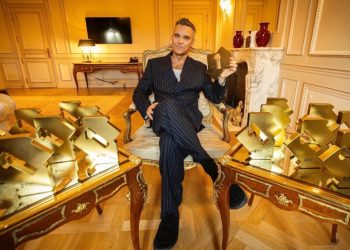 Robbie Williams depășește Beatles în topul albumelor britanice!